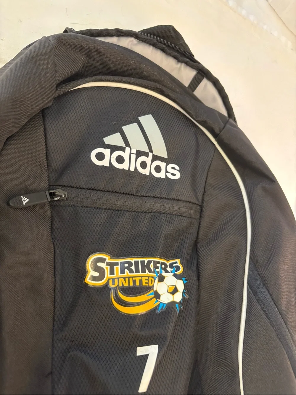 adidas Black Backpack with White Trim and Striker United Logo